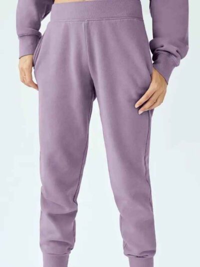 Women's hooded sweat set: soft-touch fleece, custom zipper detail, comfortable fit. Visible stitching details. Athleisure sty