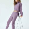 Women's hooded sweat set: soft-touch fleece, custom zipper detail, comfortable fit. Visible stitching details. Athleisure sty