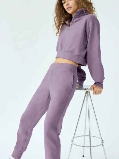 Women's hooded sweat set: soft-touch fleece, custom zipper detail, comfortable fit. Visible stitching details. Athleisure sty