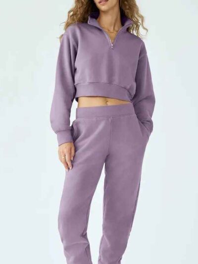 Women's hooded sweat set: soft-touch fleece, custom zipper detail, comfortable fit. Visible stitching details. Athleisure sty
