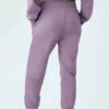 Women's hooded sweat set: soft-touch fleece, custom zipper detail, comfortable fit. Visible stitching details. Athleisure sty