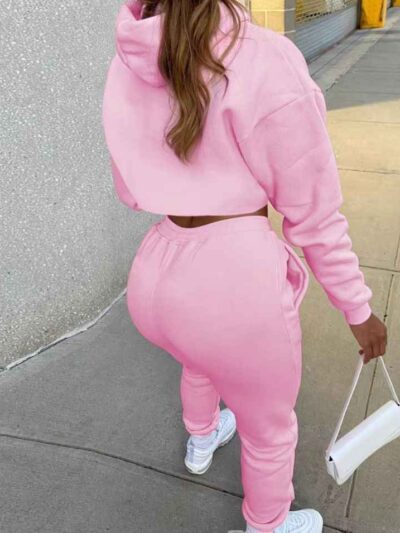 Women's tracksuit. Soft, brushed fleece. Screen printed logo detail. Custom color option. Ribbed cuffs & hem. Sporty, comfort