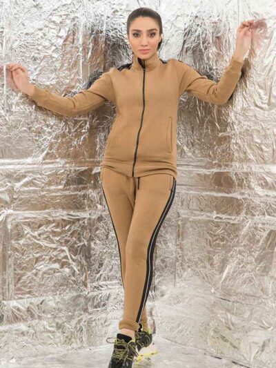 Women's zip-front tracksuit set. Soft-looking knit fabric, custom pocket detailing. Casual athletic style, likely for wholesa