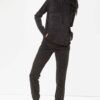 Charcoal grey fleece loungewear tracksuit for women. Cozy set with soft, plush texture and subtle stitching details. Relaxed