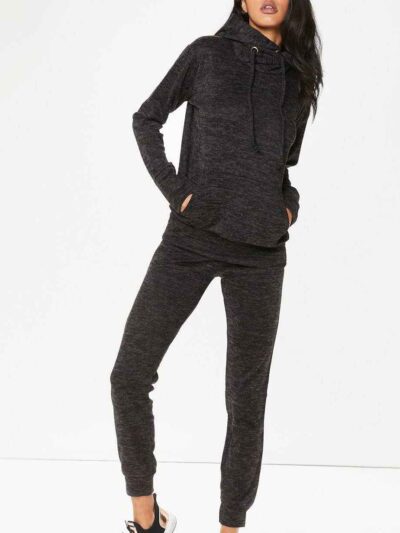 Charcoal grey fleece loungewear tracksuit for women. Cozy set with soft, plush texture and subtle stitching details. Relaxed