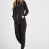 Women's zipper tracksuit. Soft-look knit fabric, tailored fit, clean stitching. Hints of grey and pink. Jacket and joggers se