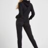 Women's zipper tracksuit. Soft-look knit fabric, tailored fit, clean stitching. Hints of grey and pink. Jacket and joggers se