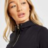 Women's zipper tracksuit. Soft-look knit fabric, tailored fit, clean stitching. Hints of grey and pink. Jacket and joggers se