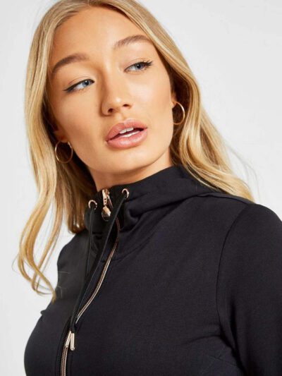 Women's zipper tracksuit. Soft-look knit fabric, tailored fit, clean stitching. Hints of grey and pink. Jacket and joggers se