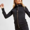 Women's zipper tracksuit. Soft-look knit fabric, tailored fit, clean stitching. Hints of grey and pink. Jacket and joggers se