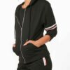 Women's sporty two-piece tracksuit. Stretchy, form-fitting polyester-spandex blend. Visible fine stitching details. Teal and