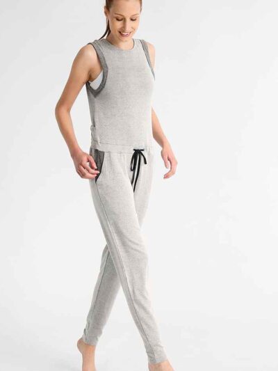 Women's ribbed knit tracksuit set. Close-up shows fine vertical ribbing texture. Soft heathered rose color. Comfortable, styl