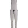 Women's ribbed knit tracksuit set. Close-up shows fine vertical ribbing texture. Soft heathered rose color. Comfortable, styl