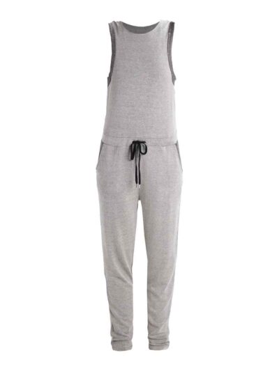 Women's ribbed knit tracksuit set. Close-up shows fine vertical ribbing texture. Soft heathered rose color. Comfortable, styl