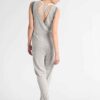 Women's ribbed knit tracksuit set. Close-up shows fine vertical ribbing texture. Soft heathered rose color. Comfortable, styl