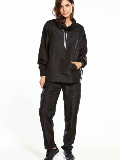 Black woven women's windbreaker tracksuit. Lightweight, subtle sheen, durable stitching. A modern athletic set perfect for la