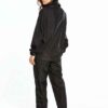 Black woven women's windbreaker tracksuit. Lightweight, subtle sheen, durable stitching. A modern athletic set perfect for la
