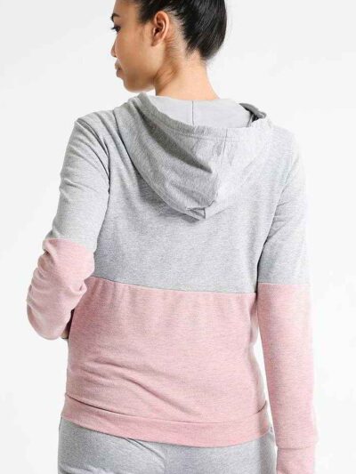 Women's workout set: Sleek jogging suit in heathered grey. Ribbed cuffs, subtle contouring seams. Soft, flexible athletic fab