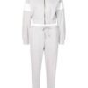 Cropped tracksuit with vibrant color blocking. Notice the textured fabric and neat stitching on this athletic-style top and b