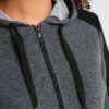 Women's running jacket with a zippered front and attached hood. Heathered fabric texture, durable stitching. Lightweight spor
