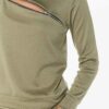 Crewneck sweatsuit with bust zipper. Soft, plush fabric, visible stitching. Custom lounge set, likely pastel or neutral tone.