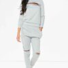 Crewneck sweatsuit with bust zipper. Soft, plush fabric, visible stitching. Custom lounge set, likely pastel or neutral tone.